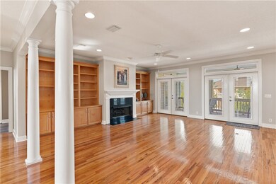 Built-in cabinets and gas log fireplace.