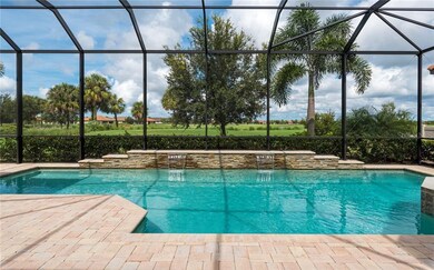 True custom pool with stacked stone on raised deck