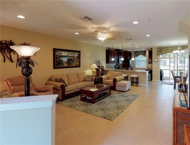 View from entry into great room, kitchen, dining a
