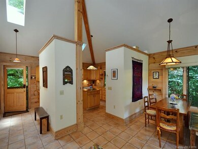 ENTRY FOYER, KITCHEN AND DINING ... ALL WARMED BY 