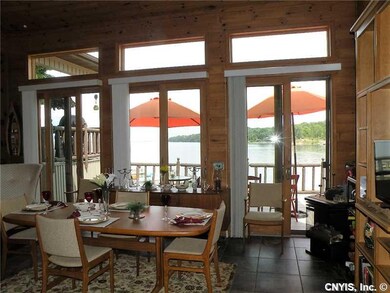 Dining Room. With gorgeous rover views from the 8 