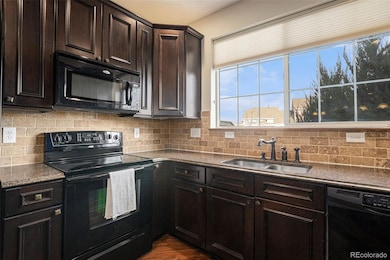 Kitchen with large window to allow natural lighting