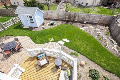 FENCED YARD, BRICK PAVER PATIO & SHED