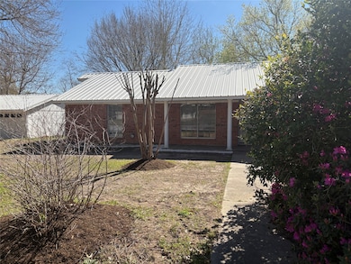 Mature trees in front and back yard