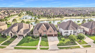 Great aerial shot of the lake directly behind the home.