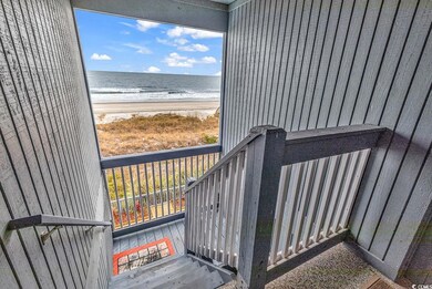 Private stairway off of the balcony to the beach o
