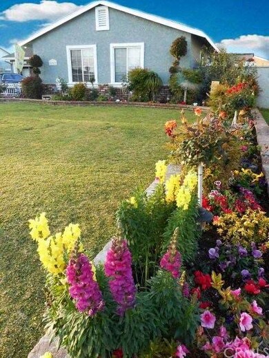 Tons of used brick hardscape accented by vibrant a