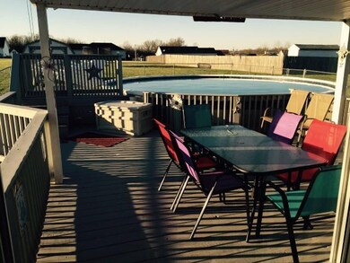 ANOTHER VIEW OF THE LARGE DECK. AND ALSO THE HUGE ONE ACRE LOT THAT GIVES YOU LOTS OF PRIVACY. 