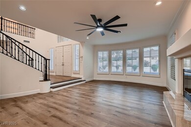 Unfurnished living room featuring baseboards, ceil