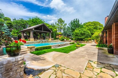 BEAUTIFUL BACKYARD WITH  POOL, CABANA & PROFESSIONAL LANDSCAPING