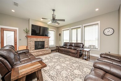 The living area has a gas log fireplace that you will enjoy this winter.