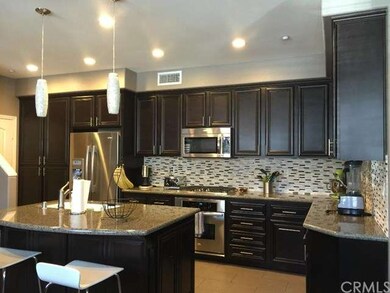 The layout of the gourmet kitchen is very spacious