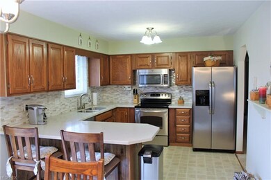 Spacious kitchen with Stainless steel appliances a
