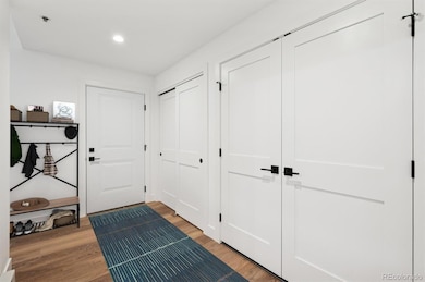 *virtually staged* ttached garage with entry to mudroom and third bedroom