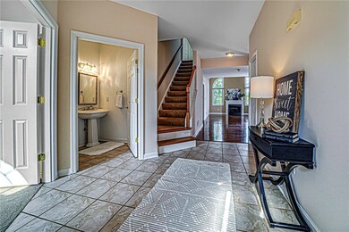 The home’s 9-foot ceilings enhance the spacious an