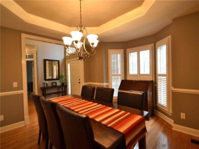 Lovely spacious dining room  . . . octagonal tray ceiling . . .  bay window . . . 