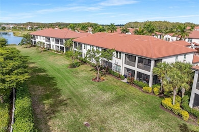 Bird's eye view of apartment complex / building and a large body of water