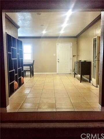 View of Living room from the family room showing t