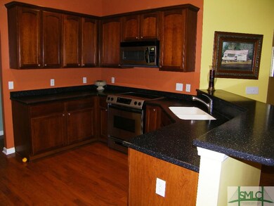 Kitchen is open to the family room.
