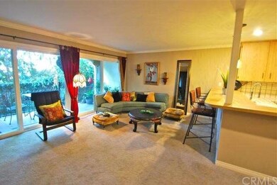 Living area with large balcony. New dual pane slid