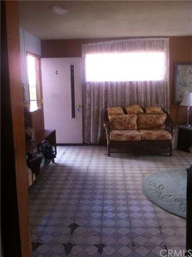 Living area & entry way.