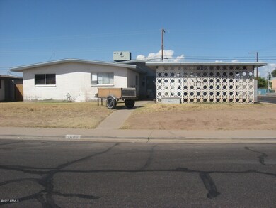 Across the street from a school