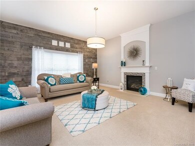 Great room w shiplap feature wall
