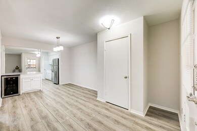 A closet is just past the entry. Dining room and d