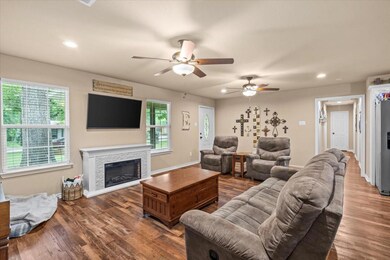 Living room featuring dark wood-type flooring and 