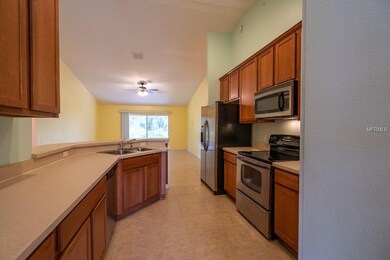 Large kitchen towards main living area. Stainless steel appliances do convey with your new home!