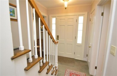 Formal entry hall opens to spacious living room