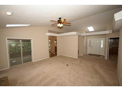 Living Room. view to foyer and dining