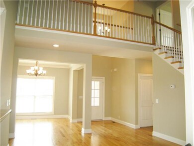 Overlooking balcony from second floor. This home h