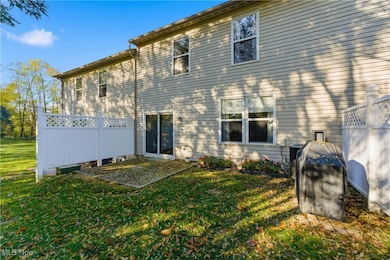 Rear view of property with a patio area