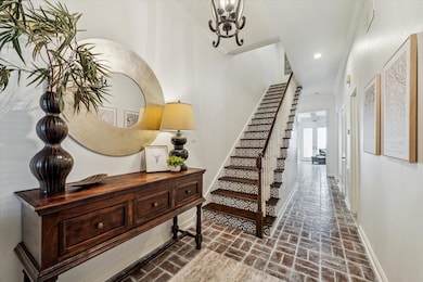 WELCOME friends and family in the well appointed Entry Hall