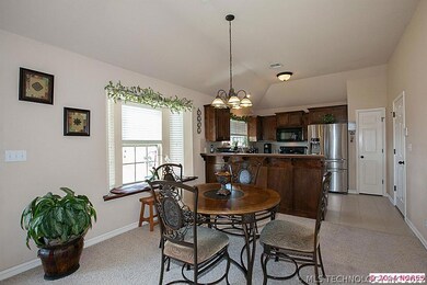 Dinning is centered between the living room and ki