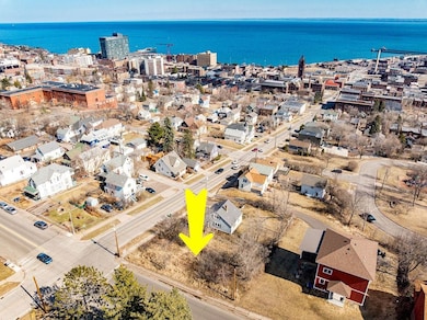 Aerial view with a view of city and a water view