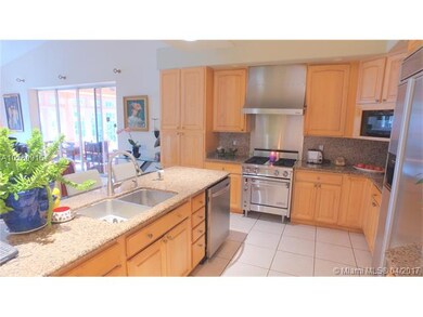 Spacious kitchen with deep sinks, island with eat 