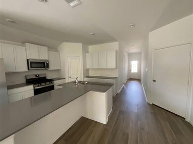 Kitchen featuring stainless steel appliances, lof