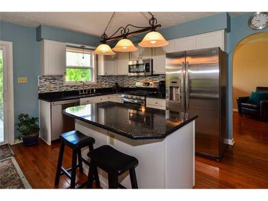 Kitchen. Beautifully updated with back splash, qua