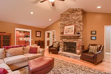 Great Room w/ Vaulted Ceilings & Recessed Lighting