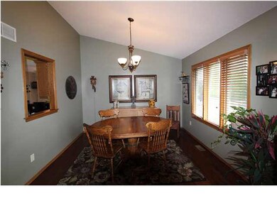 Formal Dining with hand scraped hard wood floors