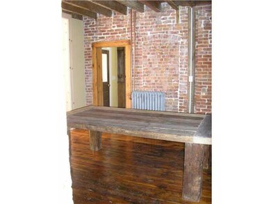 Dining Room. Original plank floors, open-beamed ce