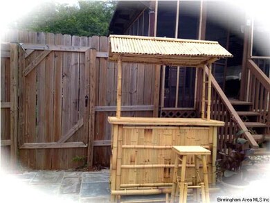 Enjoy summers entertaining at the pool's Tiki Bar.