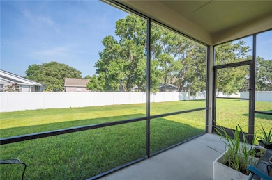 Screened porch looking out to back yard