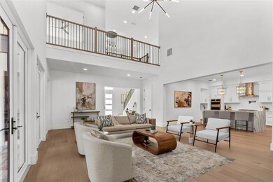 Casement opening to kitchen provides separation but still open concept