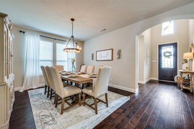 Another view of dining room and wide entry