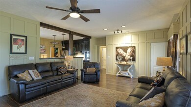 The living room is the heart of the house.  Just imagine your family here sharing time together in this surrounding!