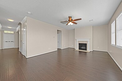Laminate wood flooring covers most of the 1st floor. The ½  bath & a closet are off the living room.