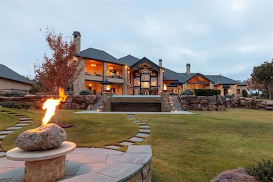 Rear view of property with a chimney, stairway, an